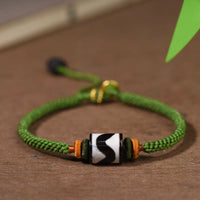 KarmaRipple's Handmade Tibetan Dzi Bead Protection Woven Green Rope Bracelet