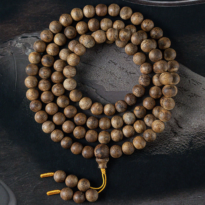 KarmaRipple's 108 Mala Beadwork Hainan Ivory Qinan Agarwood Calm Strength Bracelet p1