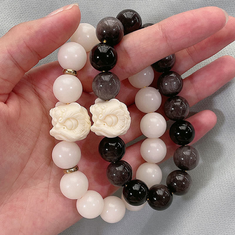 KarmaRipple's Silver Sheen Obsidian Bodhi Seed Ivory Fruit Dancing Lion Protection Bracelet p4