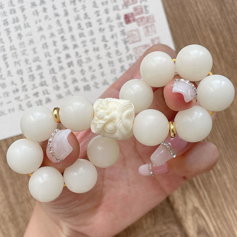 KarmaRipple's Silver Sheen Obsidian Bodhi Seed Ivory Fruit Dancing Lion Protection Bracelet p11