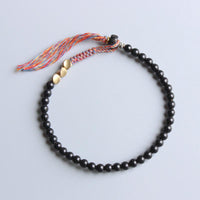 KarmaRipple's Handmade Tibetan Black Onyx Tassel Bracelet