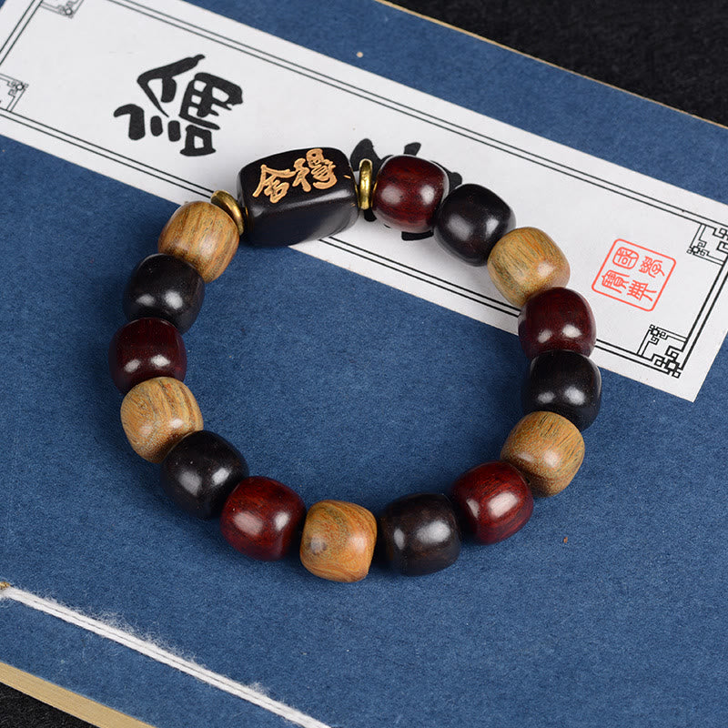 KarmaRipple's Multicolored Green Sandalwood Ebony Wood Red Sandalwood Peace Bracelet p1