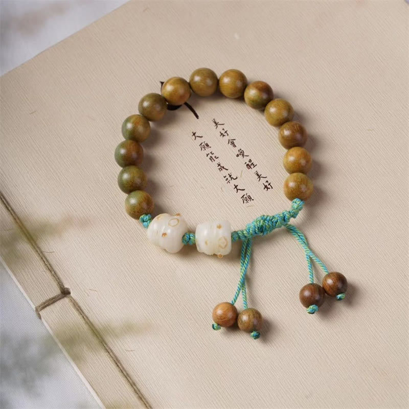 KarmaRipple's Green Sandalwood Bodhi Seed Fortunate Cat Positive Bracelet p1