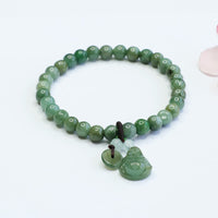 KarmaRipple's Laughing Buddha Cyan Jade Balancing Bracelet